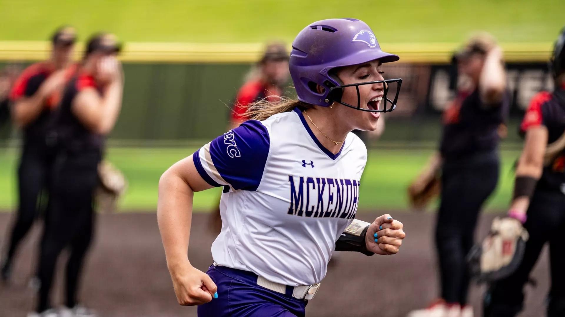 Lauren Harris is all smiles rounding the bases after another home run. 